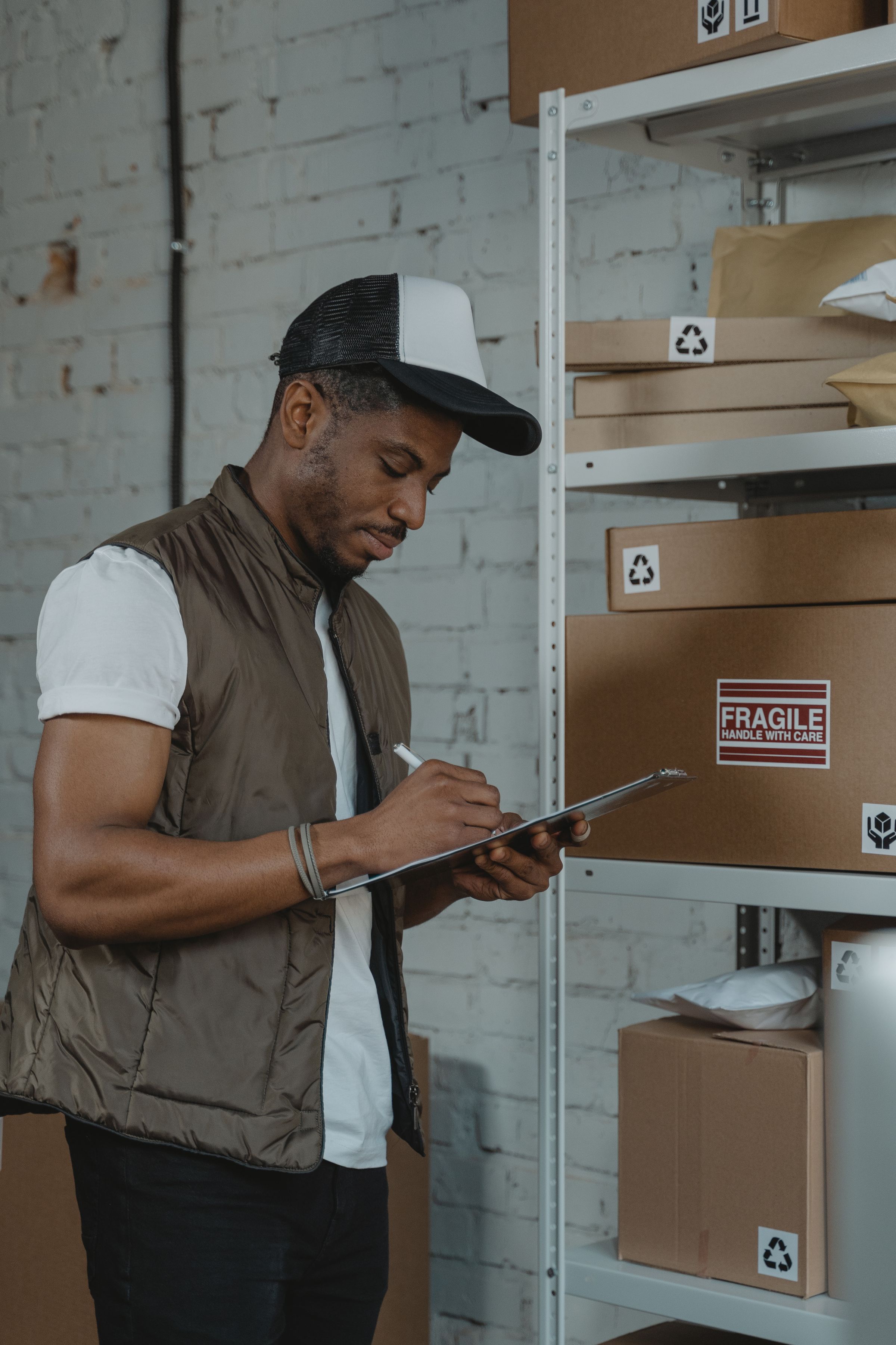 Packed e-commerce orders staged on shelves before shipment
